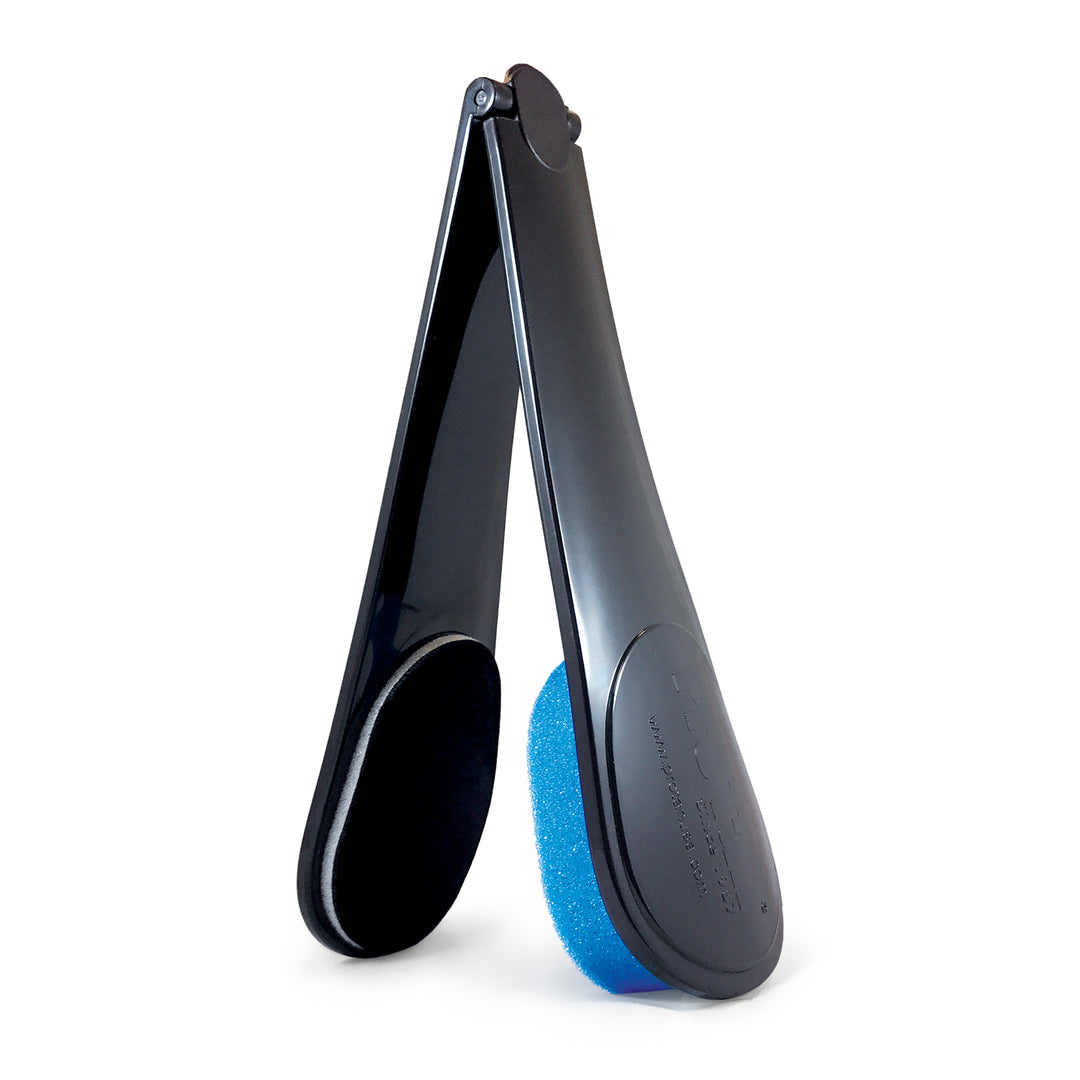 D.I.Y. Back Applicator featuring a black handle and blue sponge, ideal for easy self-tanning and rinsing.